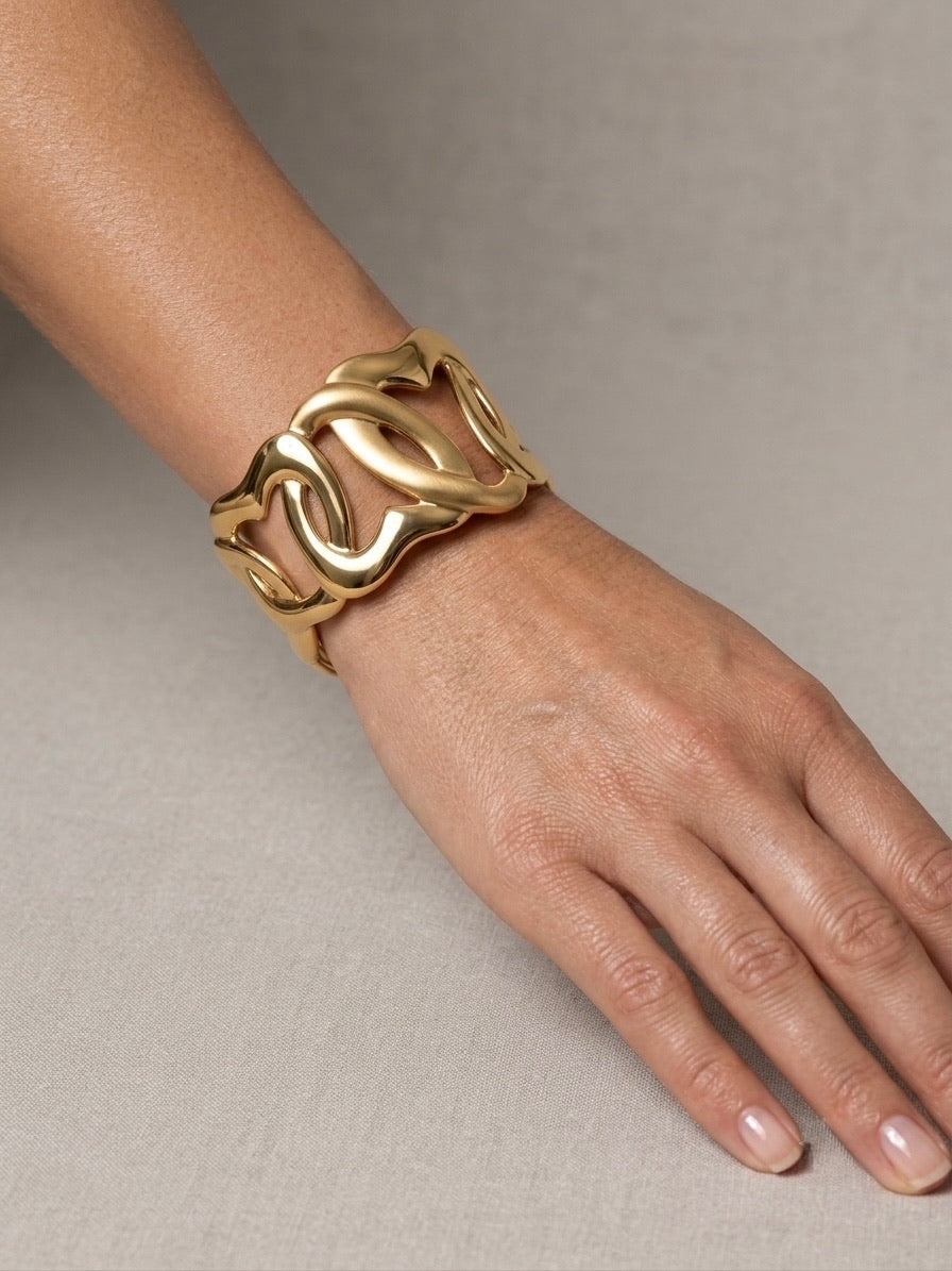 bracelet sous forme de cœurs entrelacés en acier inoxydable doré chic