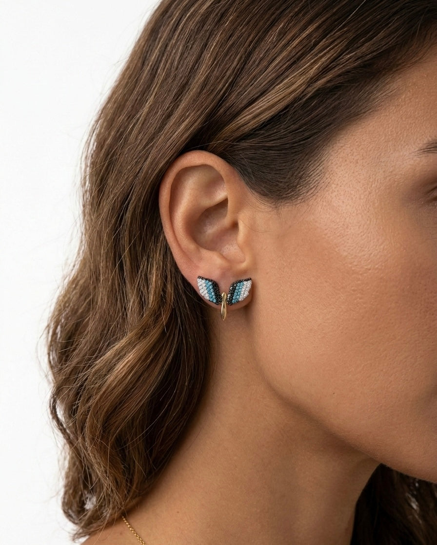 boucles d'oreilles en acier inoxydable doré avec des libellules en bleu, blanc et noir