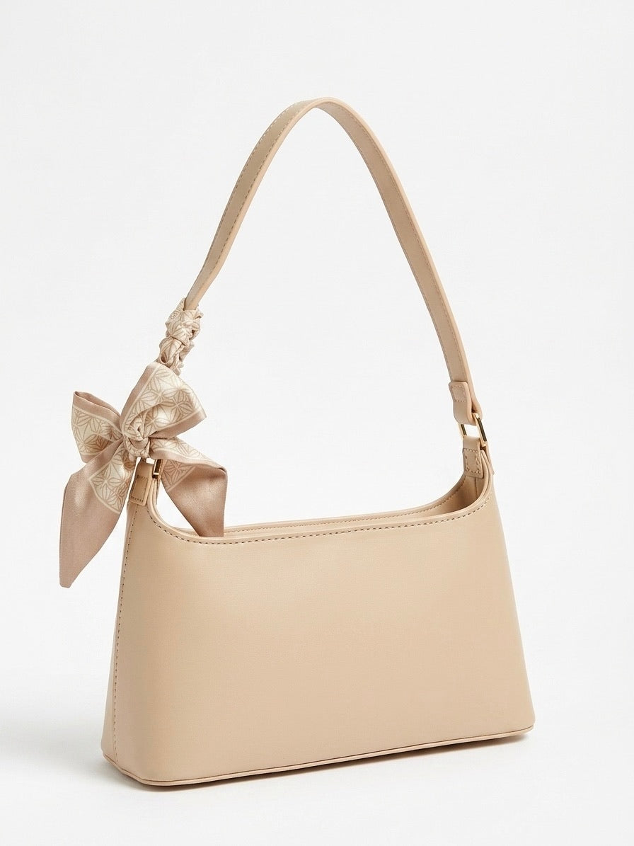 Sac à main saumon clair simple aux détails doré et ruban assorti 
