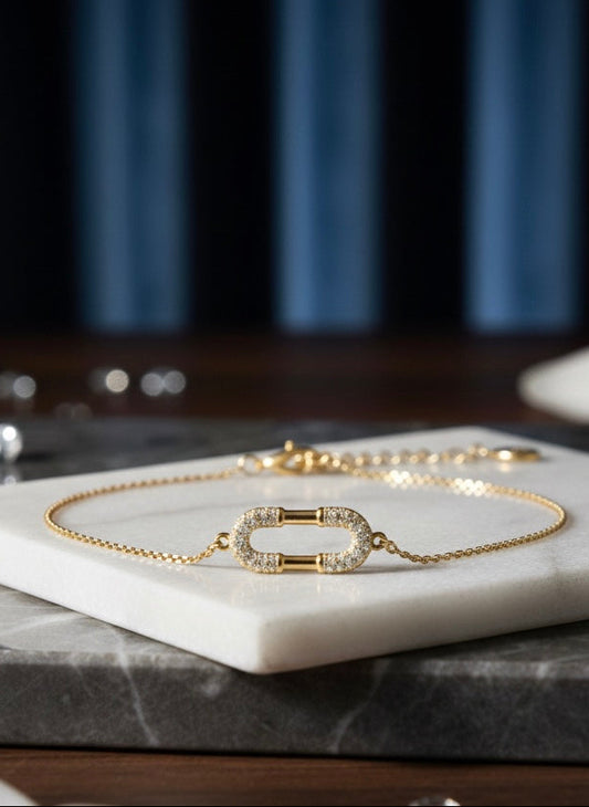 bracelet en acier inoxydable doré au motif oval pailleté