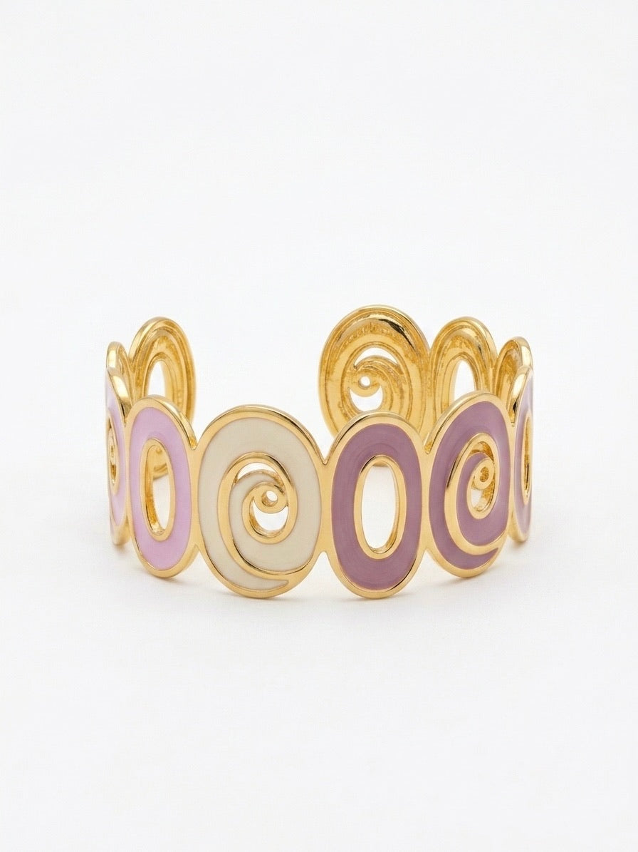 Bracelet en acier inoxydable doré avec des formes ovales blanches, violettes et mauves 