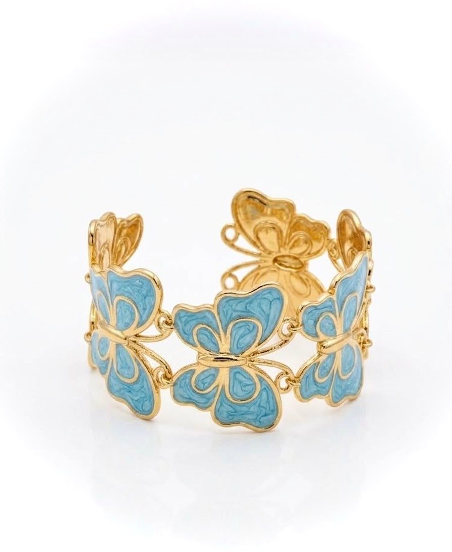 bracelet en acier inoxydable finition résine couleur doré et bleu ciel sous forme de papillons entrelacés