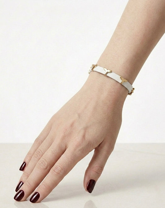 bracelet lv blanc avec details doré