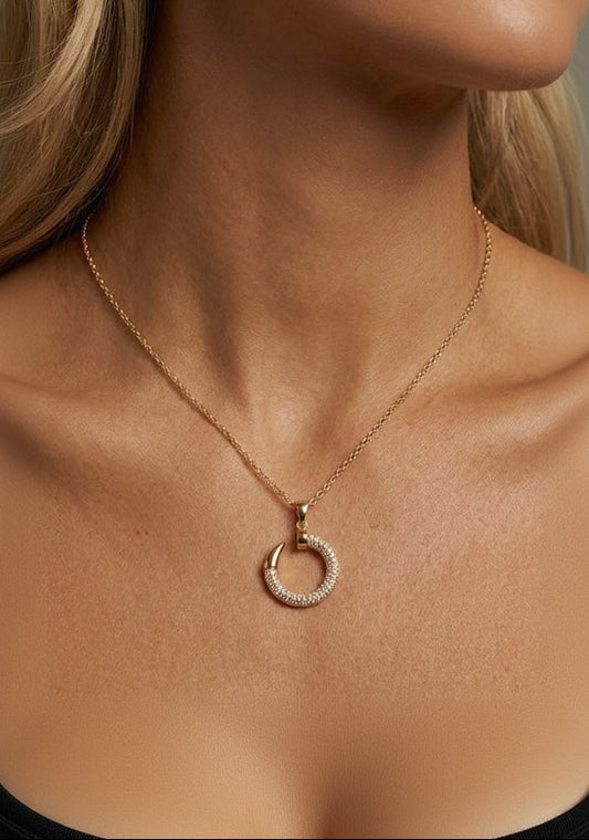 collier gold acier inoxydable sous forme de clou
